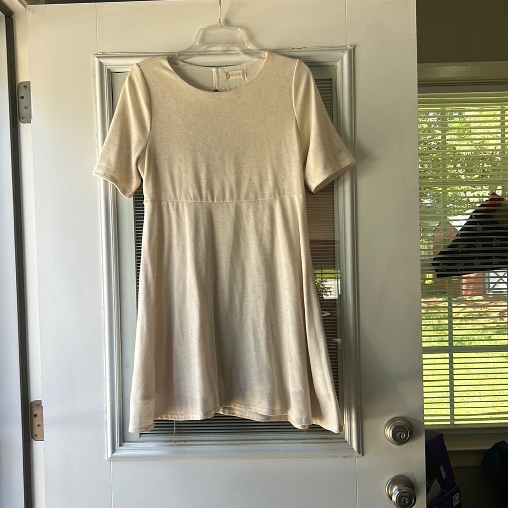 Oatmeal fully lined a line with a keyhole back, polyester linen mix